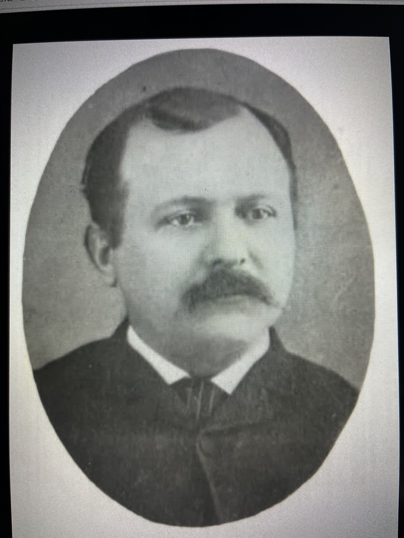 An oval portrait of a 19th-century man